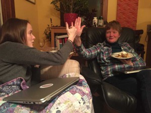 An unknown mother-daughter handshake. Are belly bumps far off?